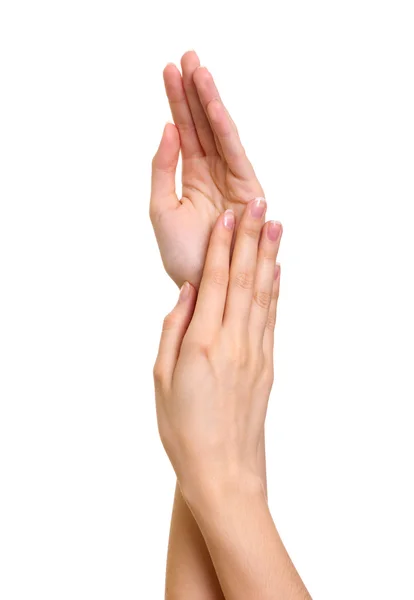 Belas mãos femininas são isoladas em um fundo branco — Fotografia de Stock