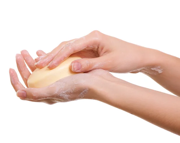 Женские руки в мыле изолированы на белом — стоковое фото