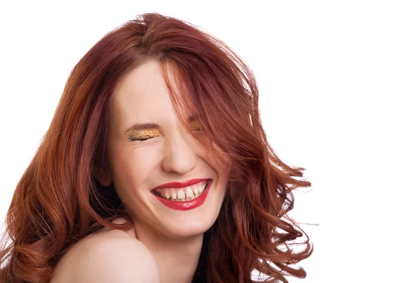 Attractive smiling woman squint eyes on white background — Stock Photo, Image