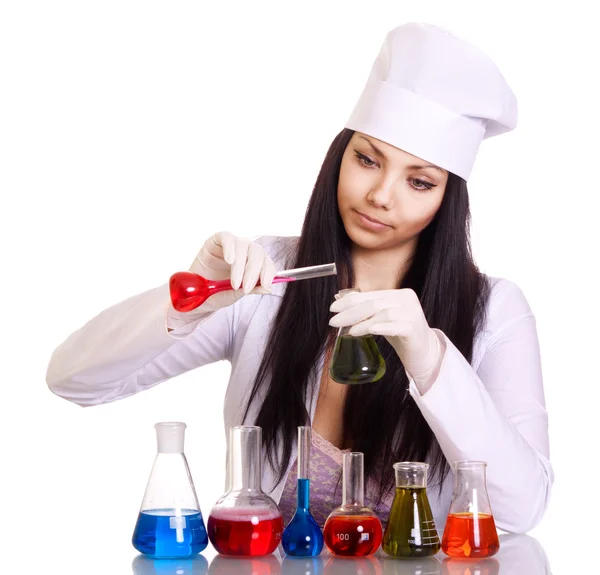 Young scientist at the table with test tubes on white background — Stock Photo, Image