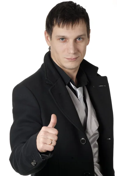 Stock image Young businessman thumbs up