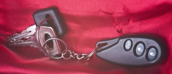 Keys Red Satin Fabric Delicate Gloss — Stock Photo, Image