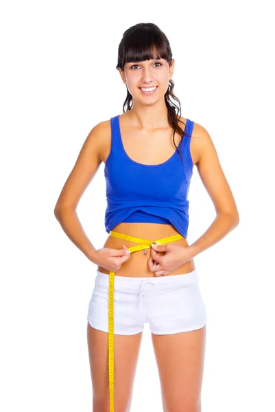 Woman measuring her waist — Stock Photo, Image