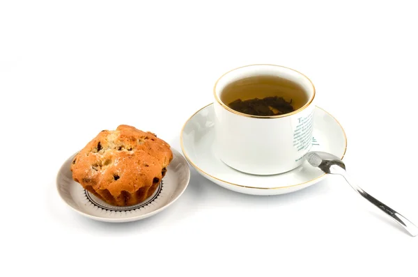 stock image Cup of tea and cake on the saucer