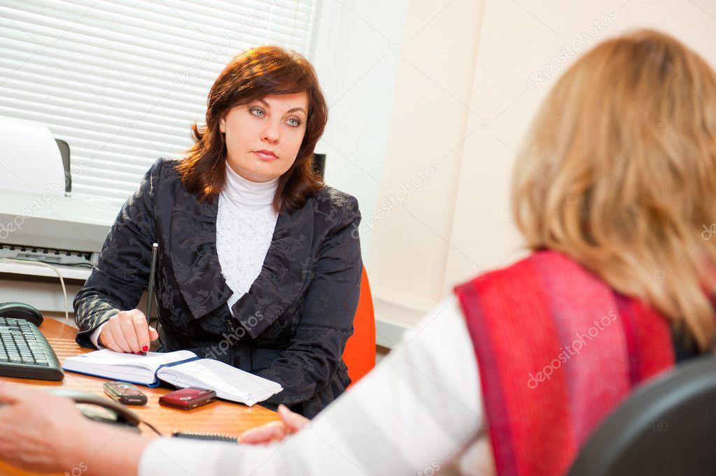 Businesswoman interviewing a candidate