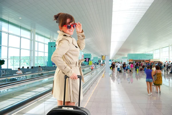 Young woman at the international airport — Stock Photo, Image
