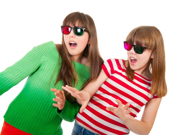 Sisters having fun while watching 3D movie — Stock Photo, Image