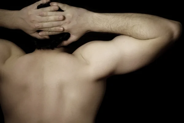 Rücken eines muskulösen Mannes — Stockfoto