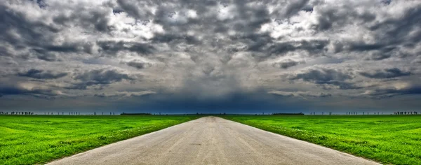 Dramatic Sky Country Road Middle Green Field — Stock Photo, Image