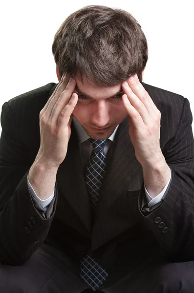 Huvudvärk av en trött och stressad affärsman — Stockfoto