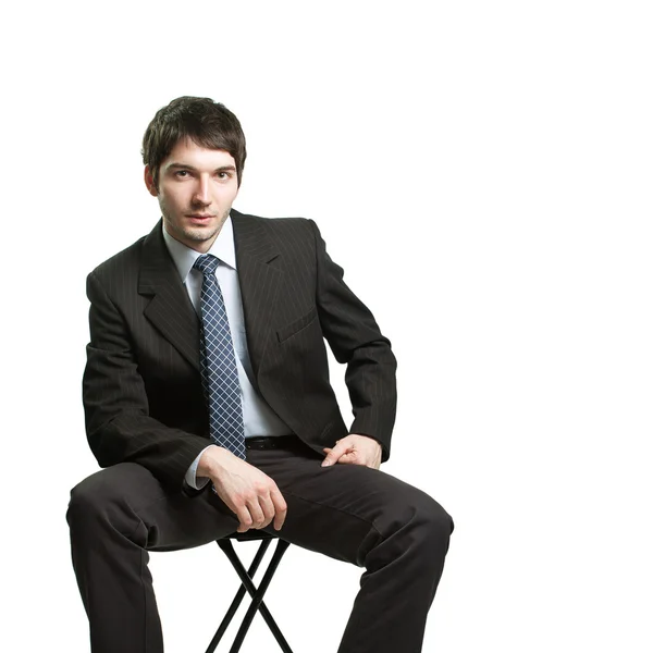 Homme d'affaires confiant assis sur une chaise — Photo