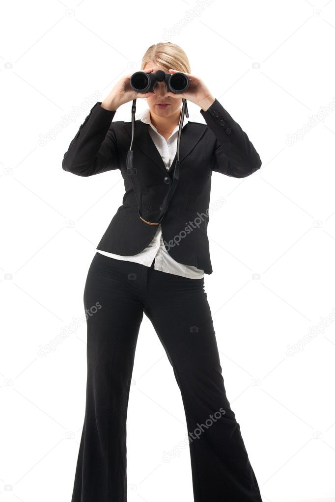 Business woman with a looking glas