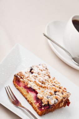 Streusel cake and a cup of coffee clipart