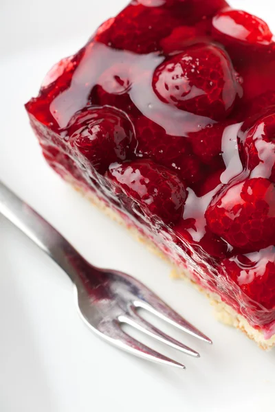 stock image Raspberry cake seen from the top and a fork