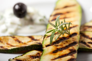 grilled zucchini with a rosemary leaf clipart