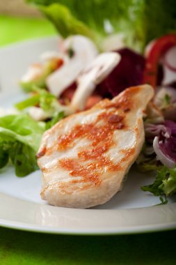 Piece of grilled chicken breast clipart