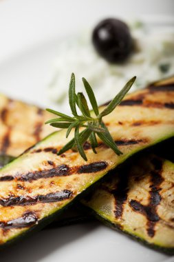 Grilled zucchini with a rosemary leaf clipart