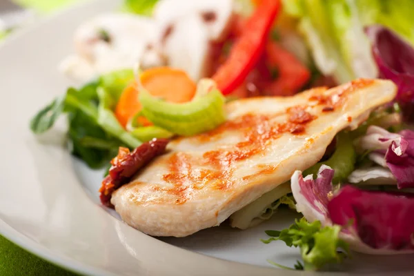 Piece of grilled chicken breast Royalty Free Stock Images