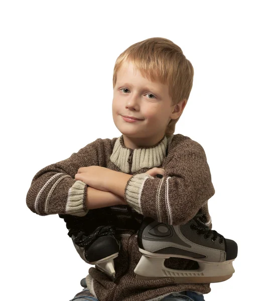 De kleine jongen met de schaatsen — Stockfoto