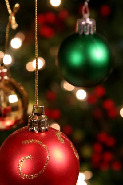 Tři vánoční ozdoby — Stock fotografie
