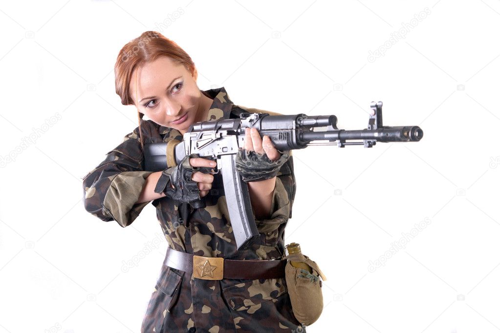 Young pretty female model in military outfit with AK-74 (Kalashnikov)
