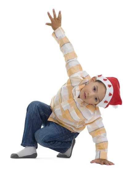 Junge mit Nikolausmütze — Stockfoto