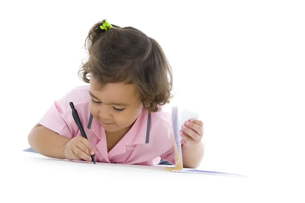 Cute girl writing — Stock Photo, Image