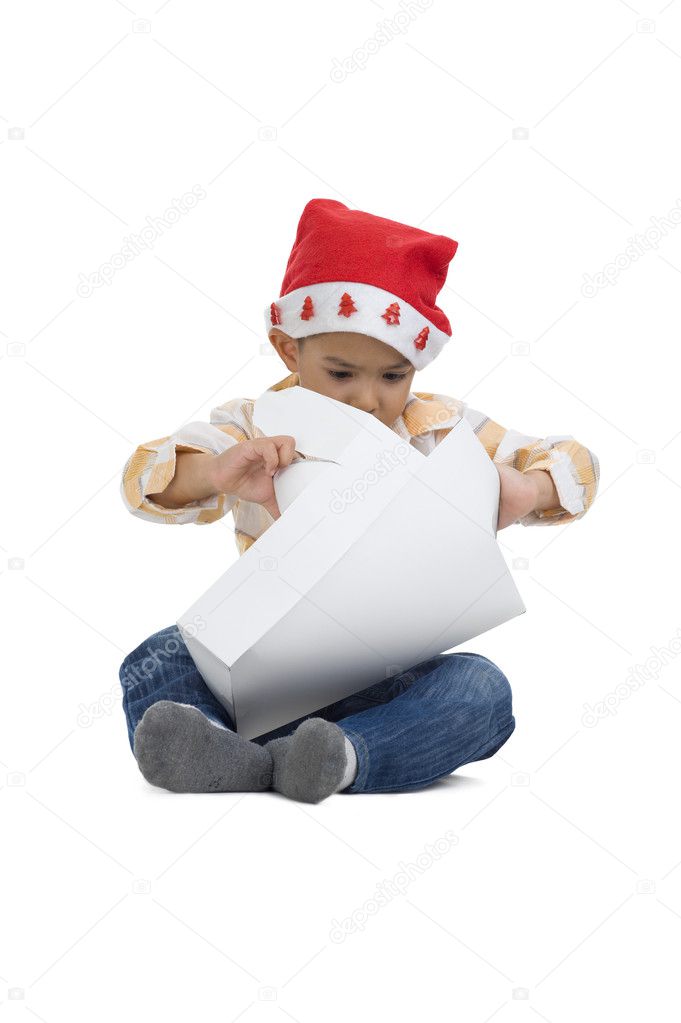 Boy opening christmas gift