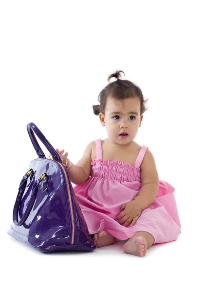 Schattig klein meisje met portemonnee — Stockfoto