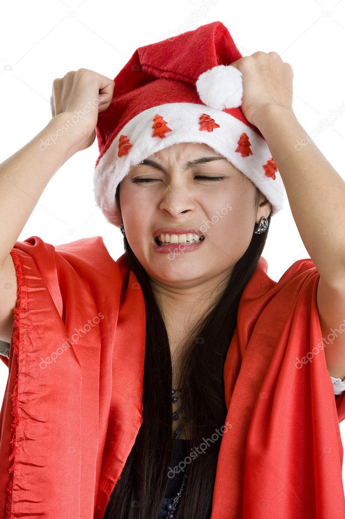 Disappointed woman with santa claus hat