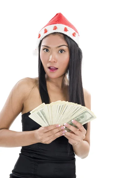 Woman with santa claus hat and money — Stock Photo, Image