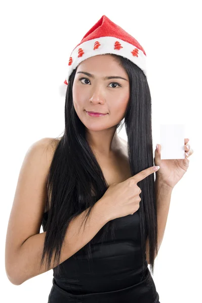 Женщина в шляпе Санты Клауса и пустой визитке — стоковое фото