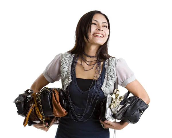 Vrouw met velen een portemonnees — Stockfoto