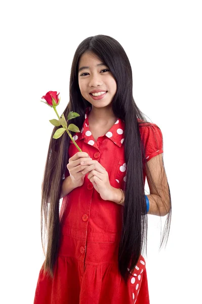 Asiática adolescente holding un rosa — Foto de Stock