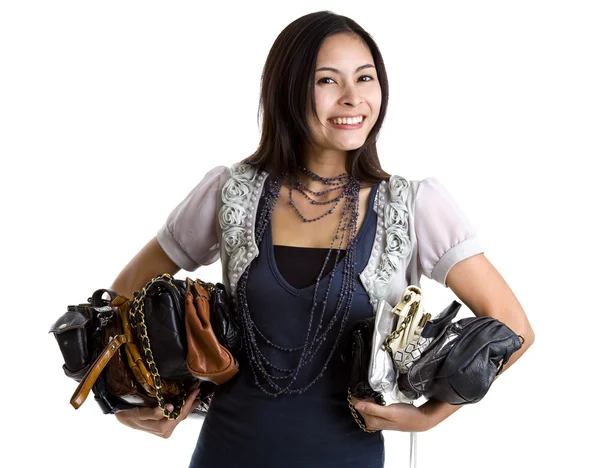 Woman with many a purses — Stock Photo, Image