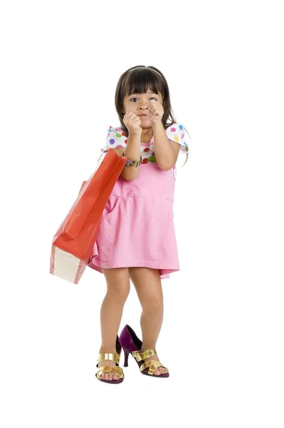 Pequena menina shopaholic — Fotografia de Stock
