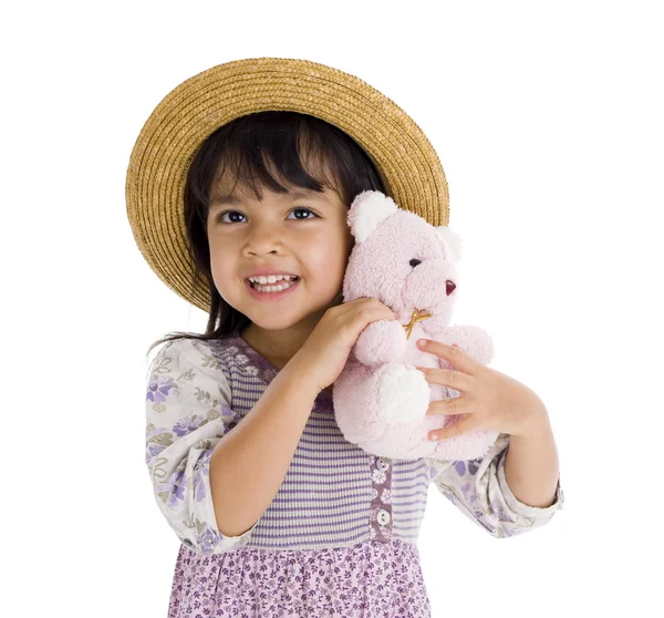 Schattig klein meisje met roze teddybeer — Stockfoto