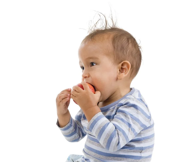 Rapaz bonito comendo uma maçã — Fotografia de Stock