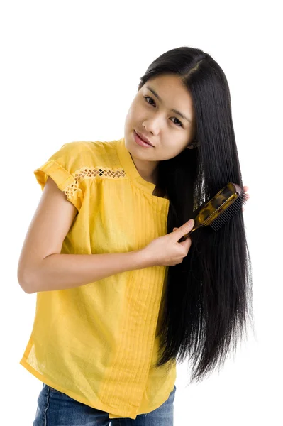 Nő fésüli a haját — Stock Fotó