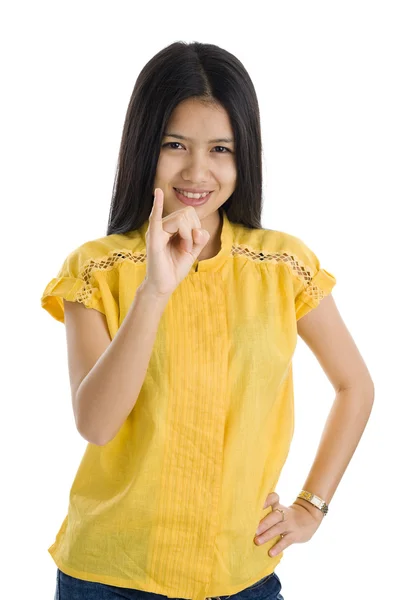 Ganska Ung Kvinna Visar Lilla Finger Att Lova Något Isolerad — Stockfoto