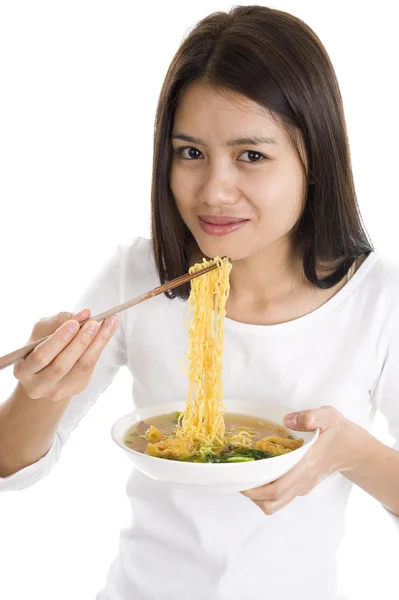 Ασιατική γυναίκα τρώει με τσεκουριά ραβδιά — Φωτογραφία Αρχείου