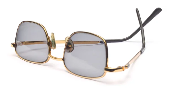 Izole altın gözlükler — Stok fotoğraf