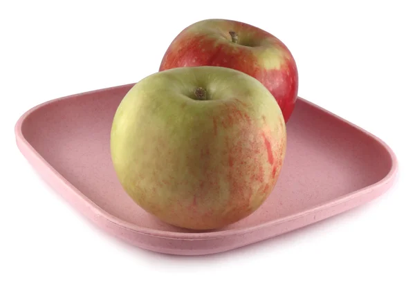 stock image Two apples on a plate