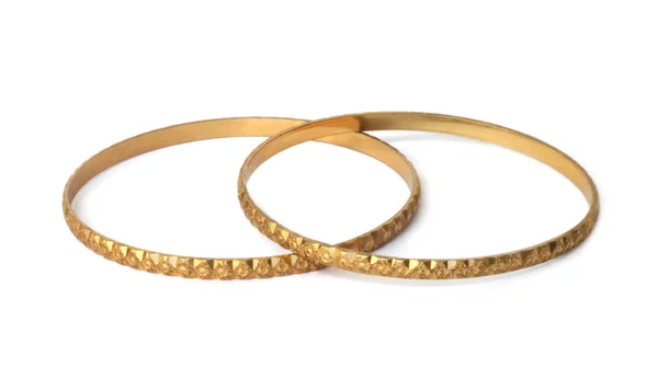 Золотые браслеты — стоковое фото
