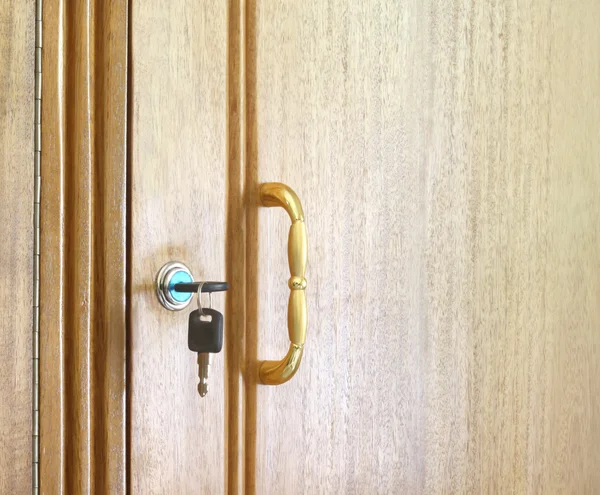 Wooden cupboard with keys — Stock Photo, Image