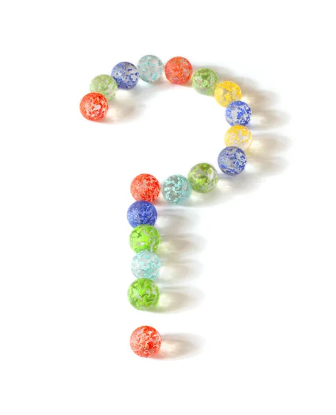 Glass marbles make question mark — Stock Photo, Image