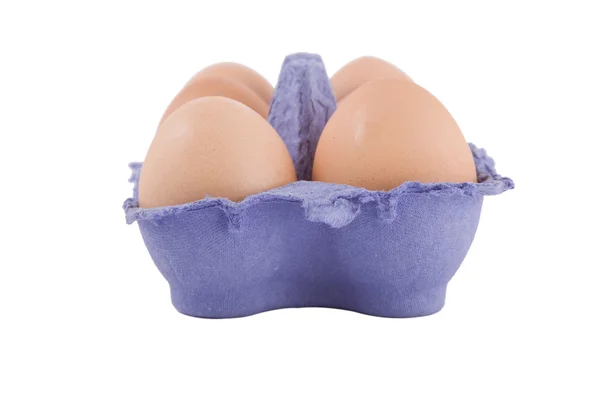 Huevos de gallinas pardas en cartón de huevo azul — Foto de Stock