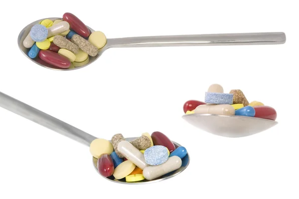 Three point of view from teaspoon with pills — Stock Photo, Image