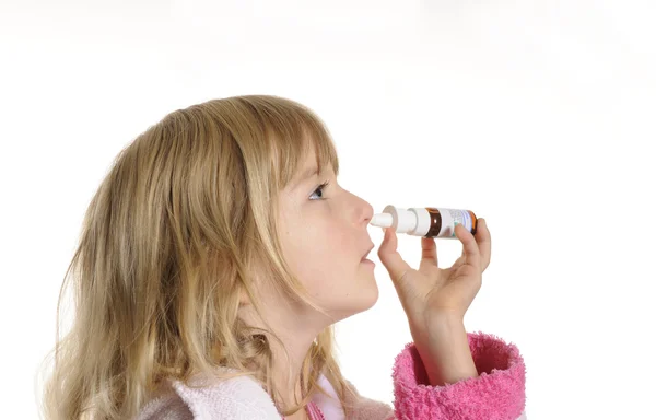 Girl takes nose drops — Stock Photo, Image