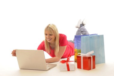 Young woman while online-shopping clipart